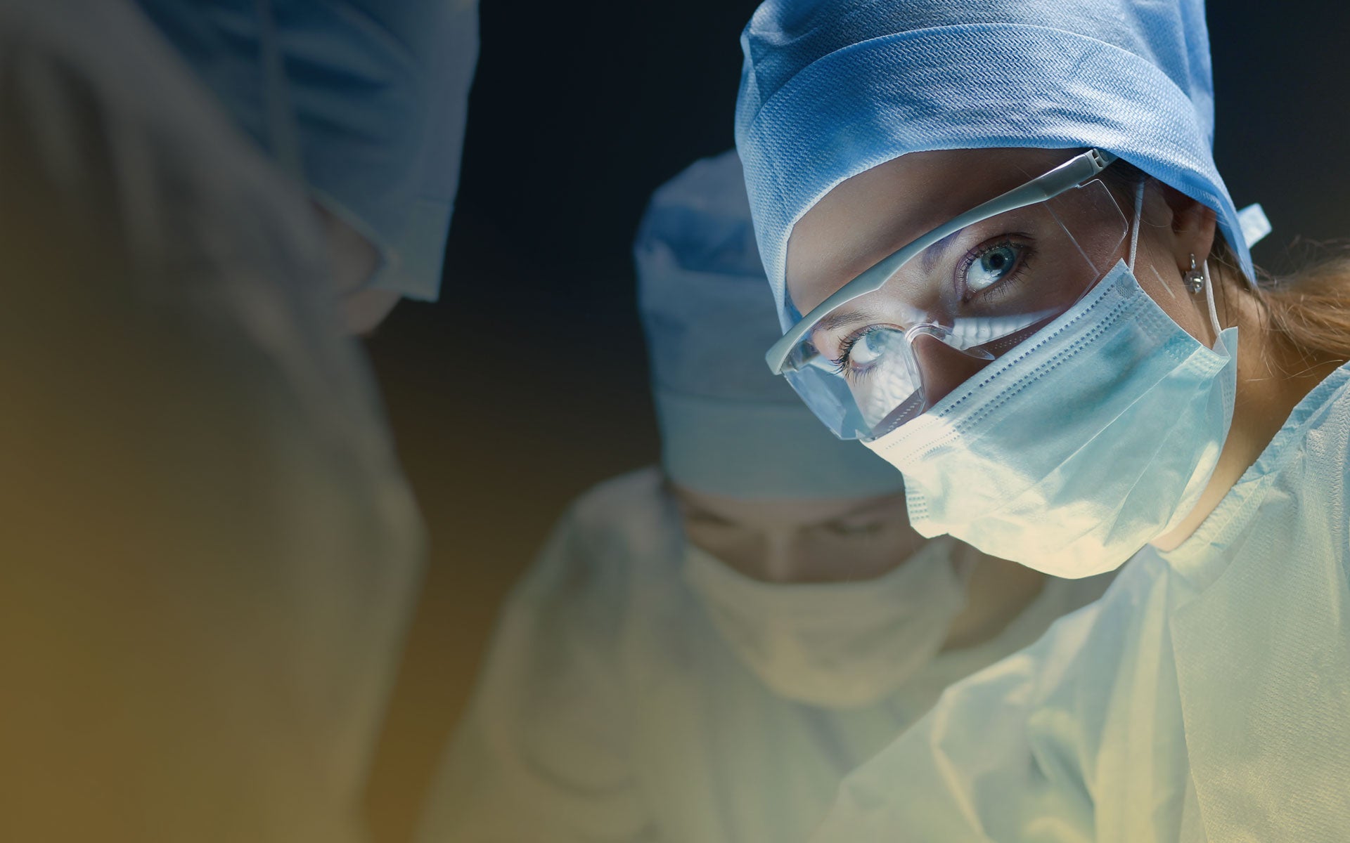 Surgeons focused during an operation.